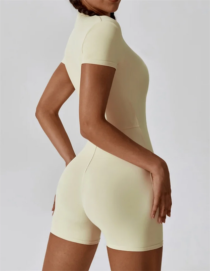 Bellanica  - Nude zip-up yoga jumpsuit, fitted